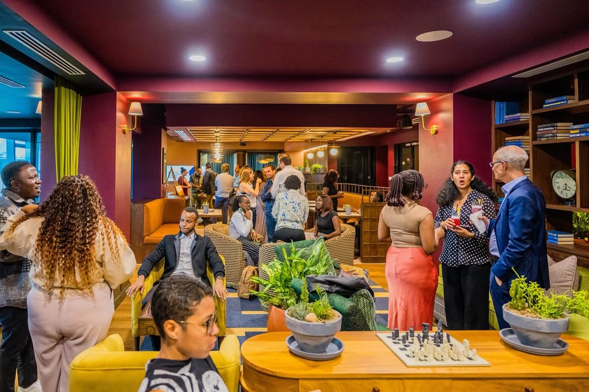 Guests networking in the JIRANI lounge